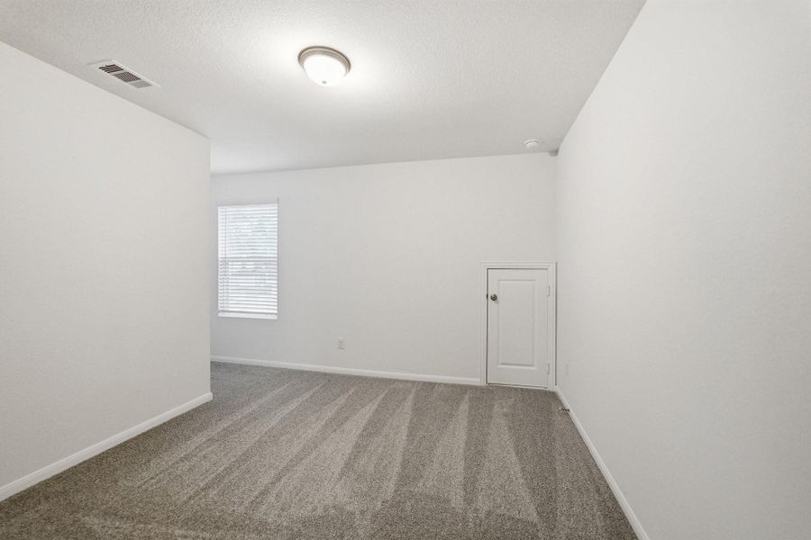 Spacious, unfurnished interior of a new home in The Canopies, Splendora (Image 21).