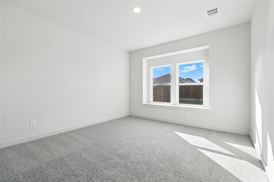 Spare room with carpet floors and recessed lighting Spare room with carpet floors and recessed lighting