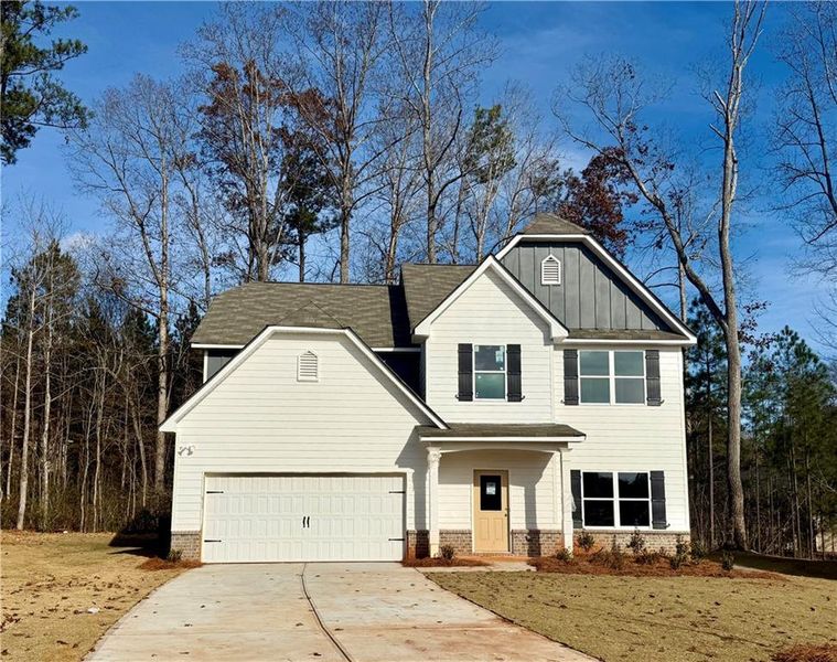 Front exterior of a new home in , Villa Rica, GA, highlighting curb appeal (Image 1). Front exterior of a new home in , Villa Rica, GA, highlighting curb appeal (Image 1).