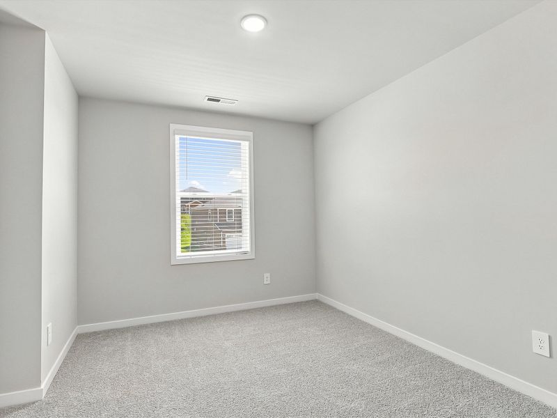 Spacious, unfurnished interior of a new home in The Heritage at Buffaloe Reserve, Raleigh (Image 16).