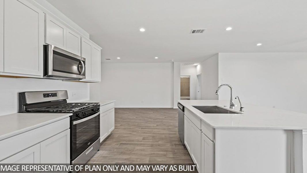 Furnished interior view inside a new home in Sunterra Lakes, Brookshire (Image 6).
