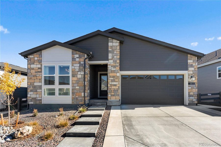 Exterior details and patio area of a home in , Castle Pines (Image 2). Exterior details and patio area of a home in , Castle Pines (Image 2).