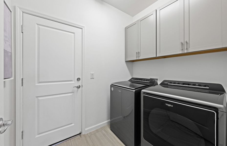 Representative furnished interior of a home built from the Cascadia by DiVosta in BeachWalk by Manasota Key, Englewood (Image 18).