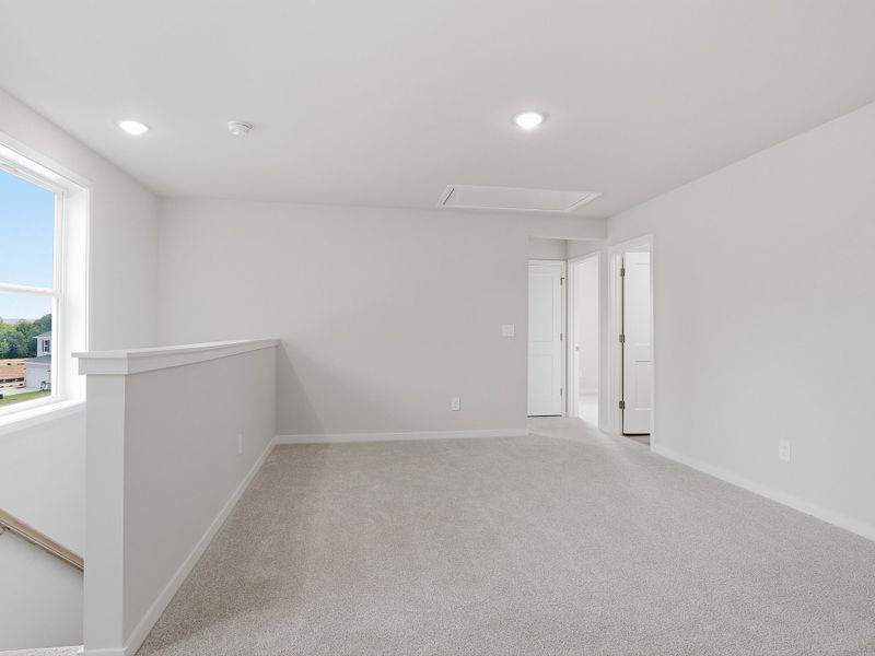 Spacious, unfurnished interior of a new home in Country Lane - Classic Series, Clayton (Image 13).