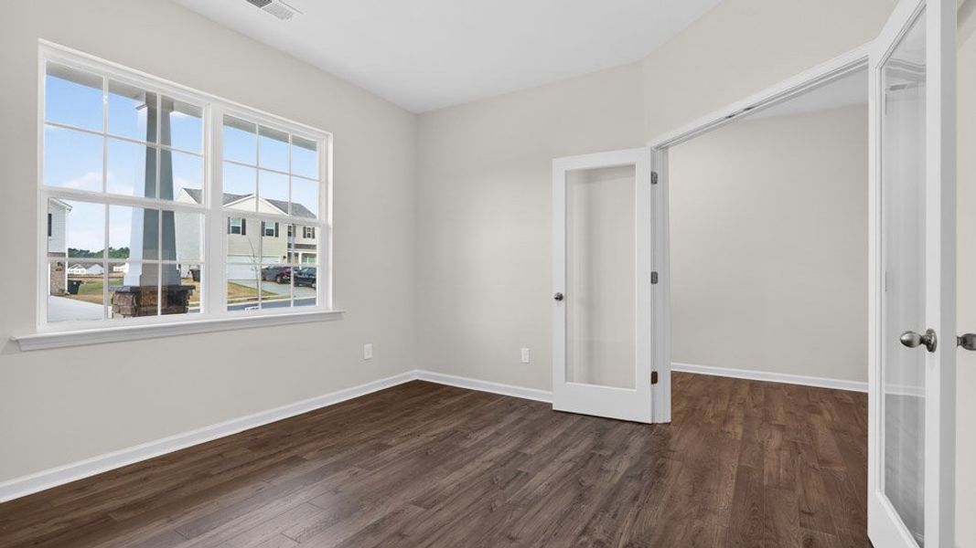 Spacious, unfurnished interior of a new home in Gretchen Pines, West End (Image 14).