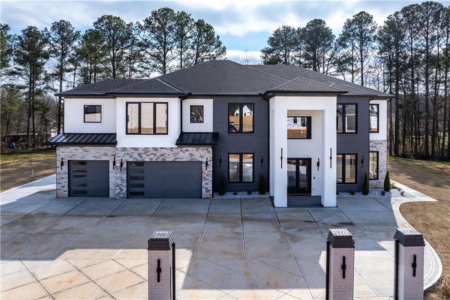 Front exterior of a new home in , Buford, GA, highlighting curb appeal (Image 28).
