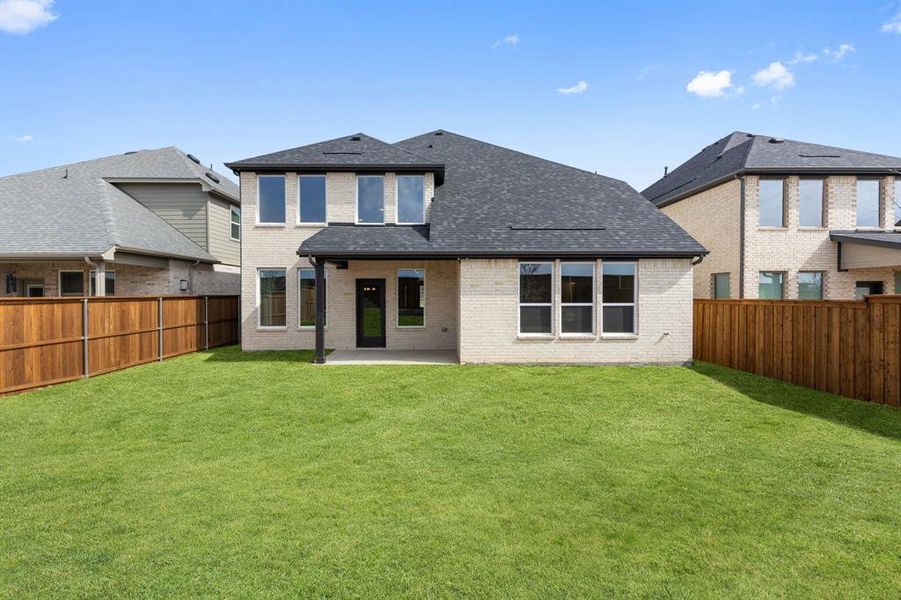 With a private fenced back yard and plenty of space, the entire family will enjoy the great outdoors in this wonderful back yard.