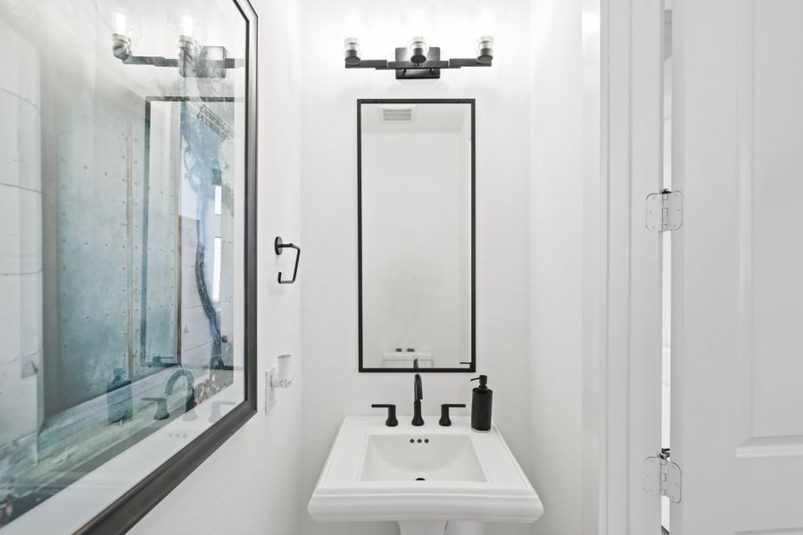 Furnished interior view inside a new home in Harvest Green 50', Richmond (Image 24).