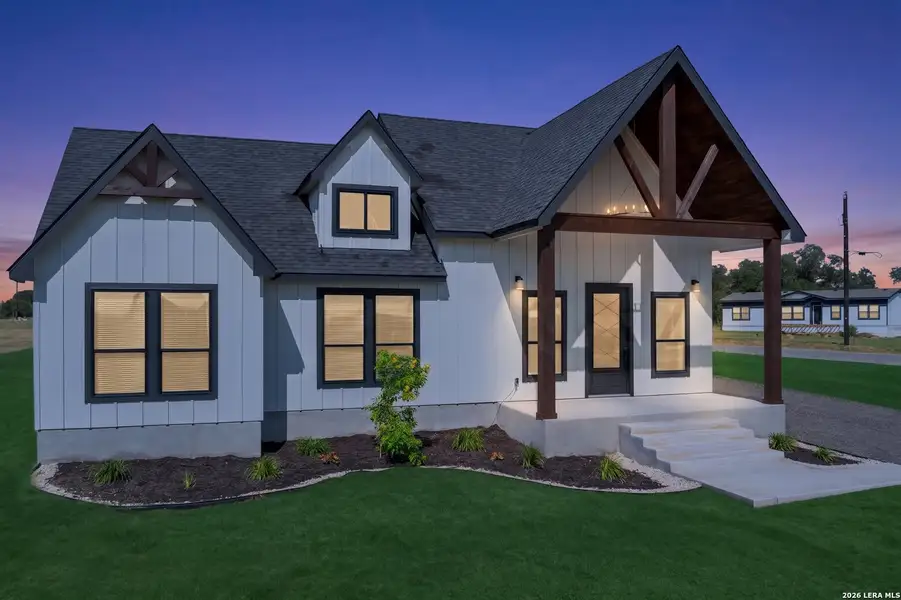 Front exterior of a new home in , Atascosa, TX, highlighting curb appeal (Image 24).
