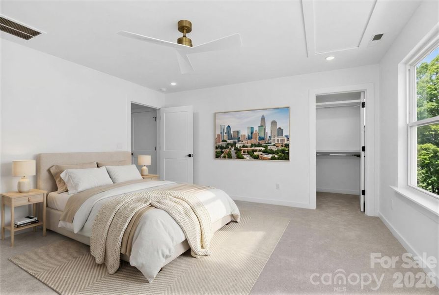 Top floor primary suite virtually staged.