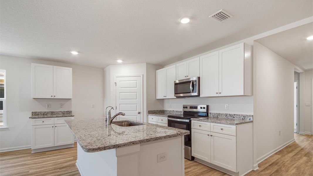 Furnished interior view inside a new home in Sunny Hills, Chipley (Image 9).