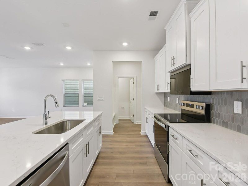 Photo is not of the actual home, but is an inspirational photo of builder’s model home and may depict options, furnishings, and/or decorator features that are not included