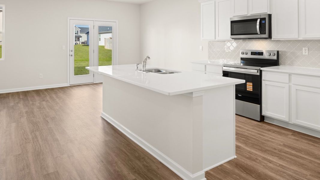 Furnished interior view inside a new home in The Preserve at Agricultural Village, Perry (Image 4).