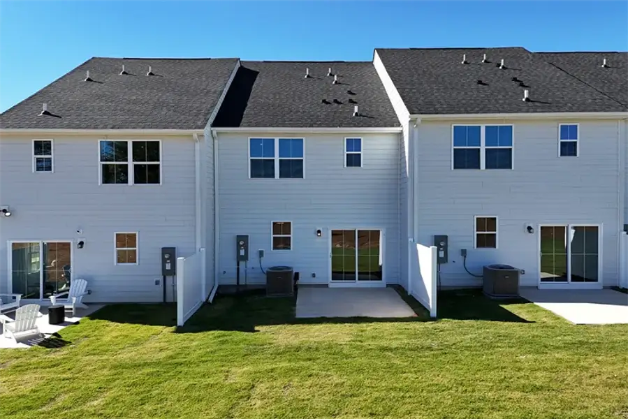 Exterior details and patio area of a home in Townes At Abner Creek, Greer (Image 2).