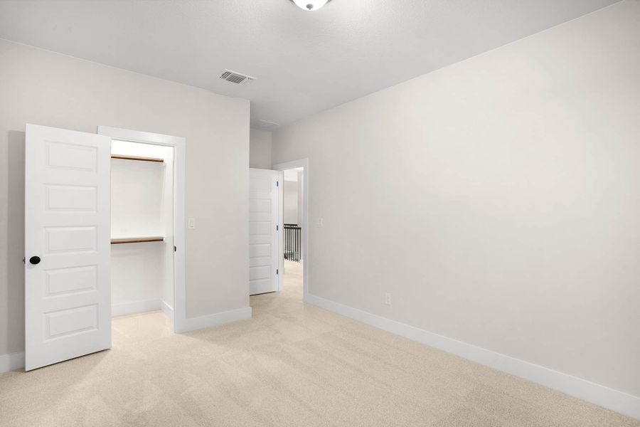 Representative unfurnished interior of a home built from the Cornell – 60′ Lot by Chesmar Homes in Lakes of Cane Island, Katy (Image 19).