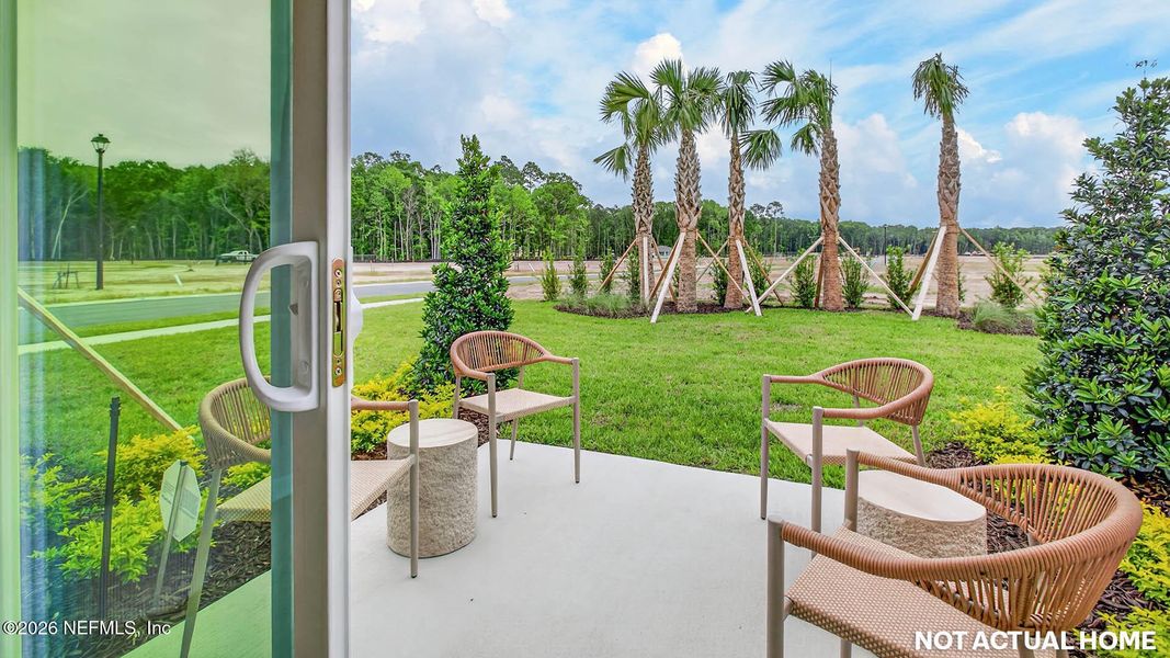 Exterior details and patio area of a home in Sawmill Branch, Palm Coast (Image 2). Exterior details and patio area of a home in Sawmill Branch, Palm Coast (Image 2).