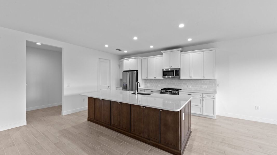 Furnished interior view inside a new home in SkySail, Naples (Image 10).