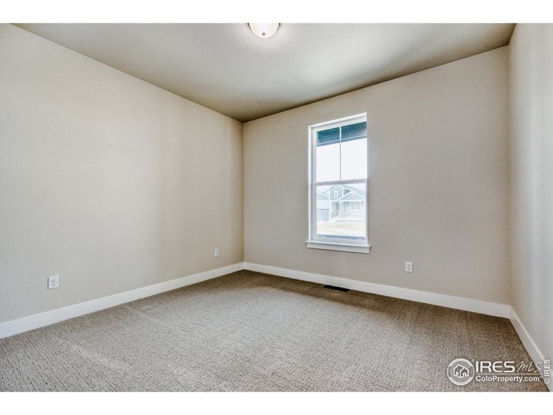 Spacious, unfurnished interior of a new home in Barefoot Lakes, Firestone (Image 25).