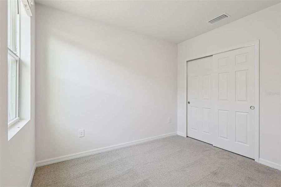 Spacious, unfurnished interior of a new home in Bradbury Creek - Signature Series, Haines City (Image 31).