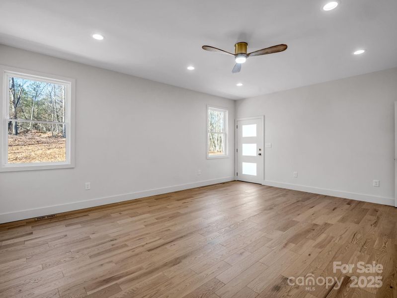 Primary Suite opens to stone patio Primary Suite opens to stone patio