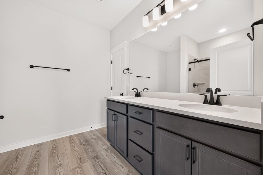 Furnished interior view inside a new home in Aldeana, Bonney (Image 12).