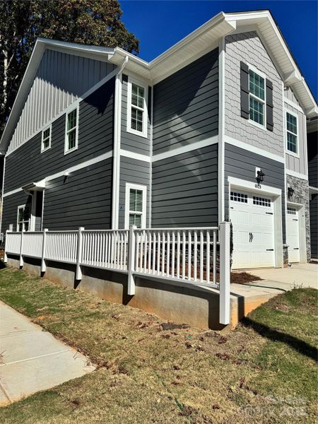 Exterior details and patio area of a home in Pine Trace, Gastonia (Image 15).