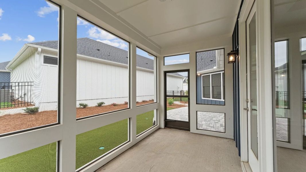 Exterior details and patio area of a home in The Courtyards at Redbud Lane, Canton (Image 14).