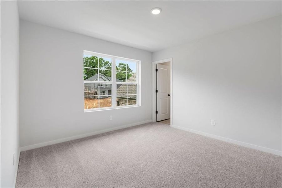 Spacious, unfurnished interior of a new home in Windsong Estates, McDonough (Image 11).