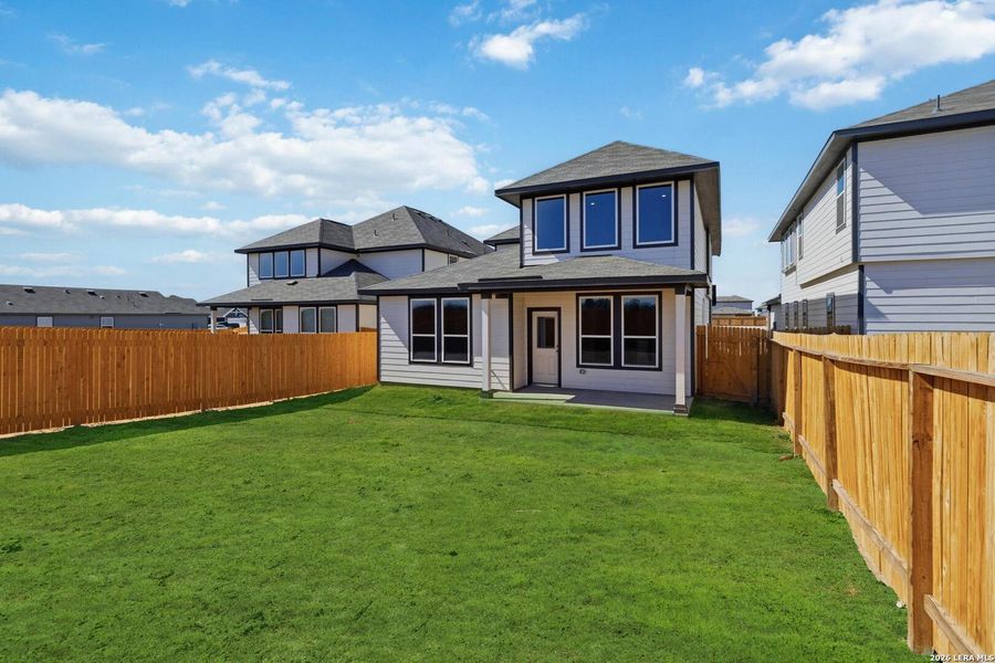 Exterior details and patio area of a home in Red Hawk Landing, San Antonio (Image 21).