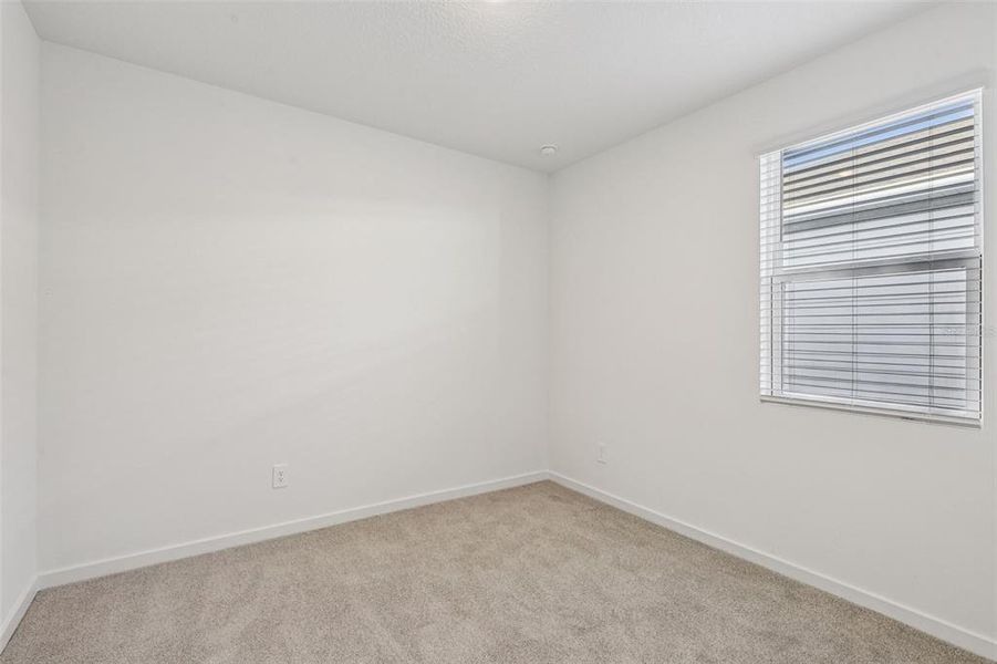 Spacious, unfurnished interior of a new home in Colbert Landings, Palm Coast (Image 12).