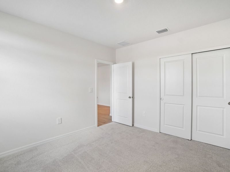 Spacious, unfurnished interior of a new home in Pine Ridge Meadows, Hudson (Image 22).