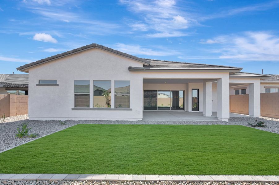 Exterior details and patio area of a home in Sentiero at Windrose, Waddell (Image 3).