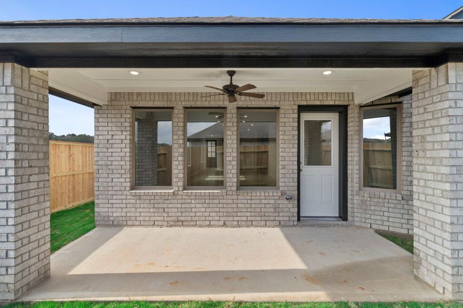 Exterior details and patio area of a home in The Trails 40', New Caney (Image 3).