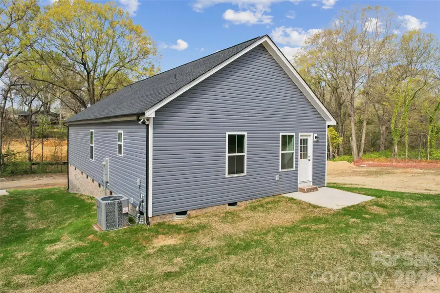 Exterior details and patio area of a home in , Spencer (Image 4). Exterior details and patio area of a home in , Spencer (Image 4).