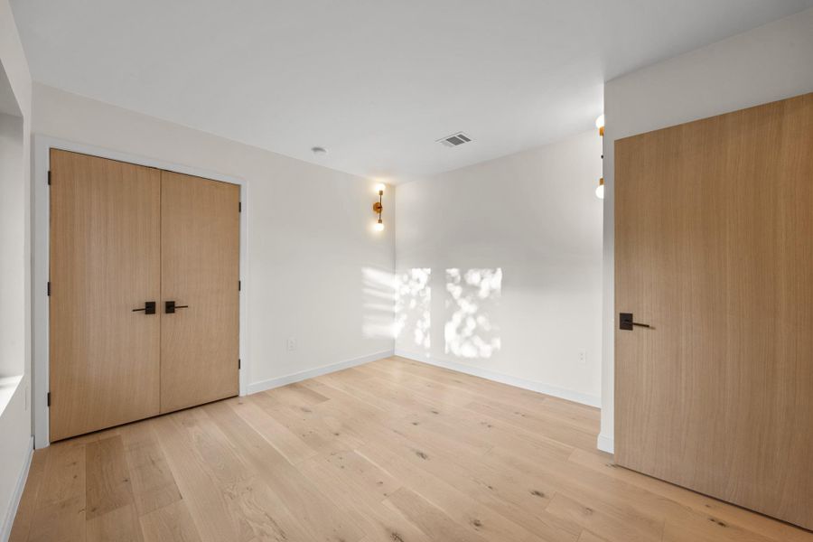 4th bedroom with Vinyl floors and double cloets 4th bedroom with Vinyl floors and double cloets