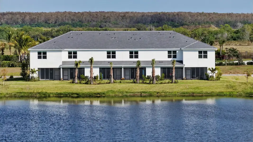 Representative exterior photo of a completed home built from the Parker by Neal Communities in SkySail, Naples, FL (Image 2).