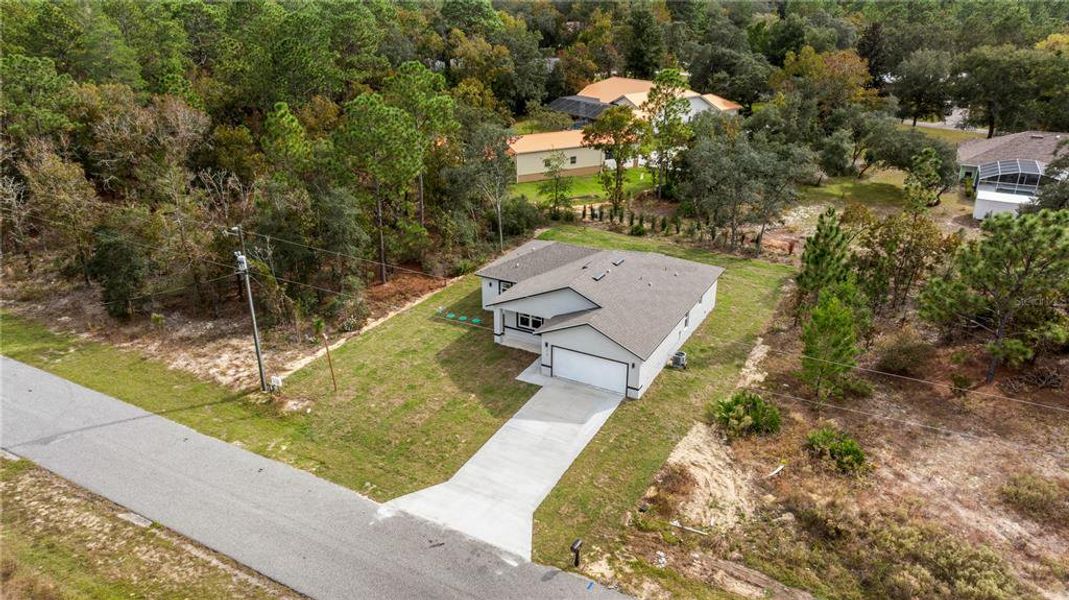 Front exterior of a new home in , Dunnellon, FL, highlighting curb appeal (Image 20).