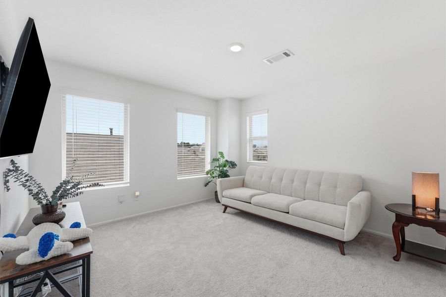 Furnished interior view inside a new home in Pinewood at Grand Texas, New Caney (Image 16).
