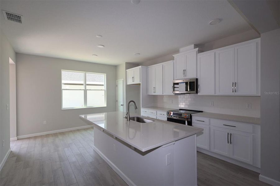 Furnished interior view inside a new home in Center Lake on the Park, St. Cloud (Image 8). Furnished interior view inside a new home in Center Lake on the Park, St. Cloud (Image 8).