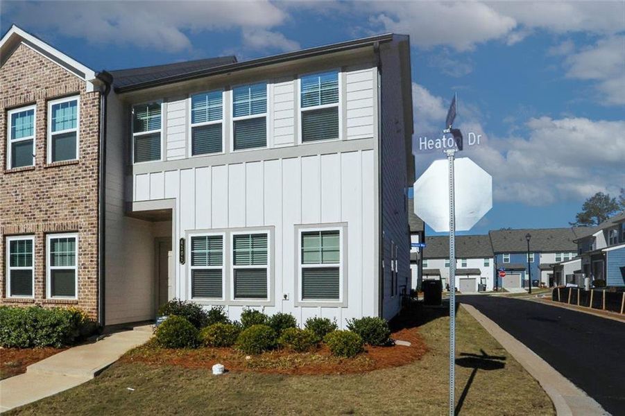Front exterior of a new home in Laurelwood, Douglasville, GA, highlighting curb appeal (Image 29).