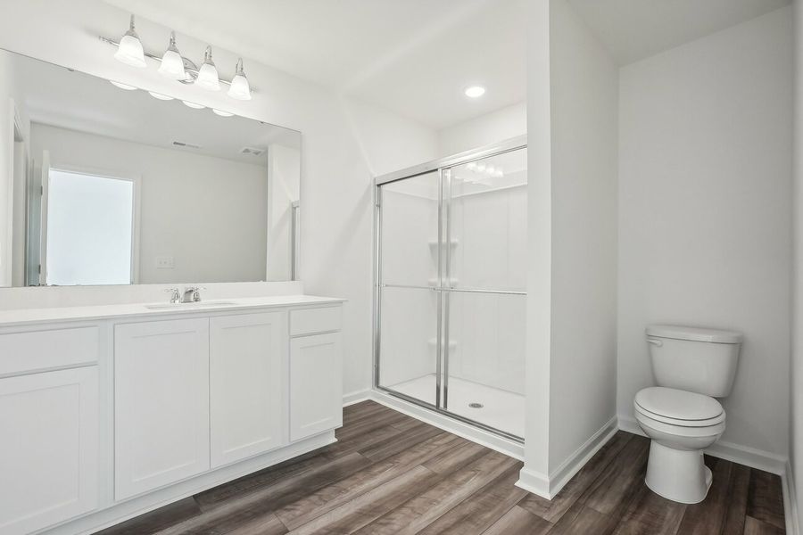 Furnished interior in a model home at Walker Station in Wilson (Image 6).