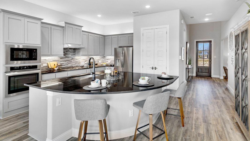 Representative furnished interior of a home built from the Magnolia by Brightland Homes in The Oaks, Red Oak (Image 10).