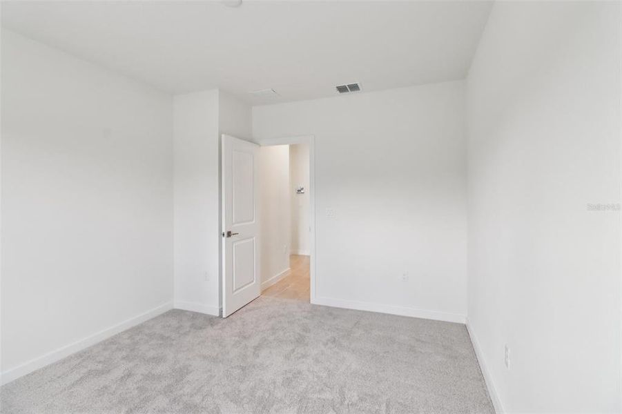 Spacious, unfurnished interior of a new home in Cyrene at Harmony, St. Cloud (Image 22).