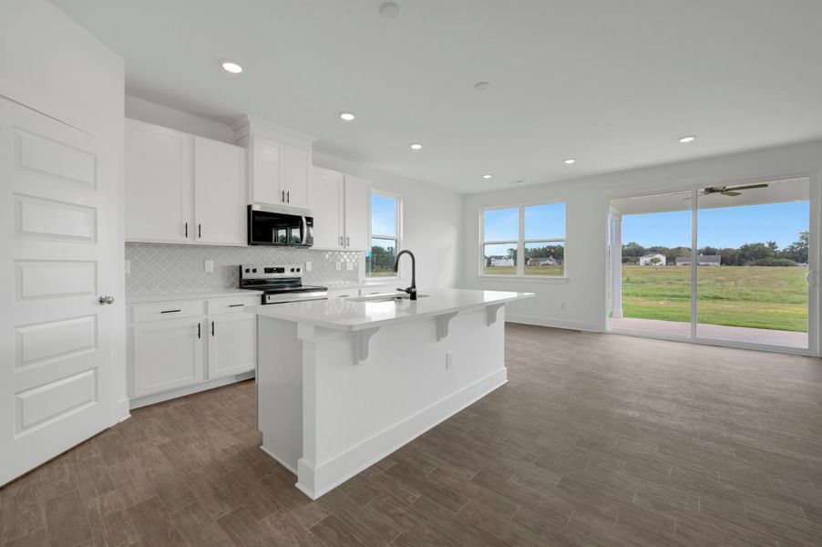 Furnished interior view inside a new home in McAlister Creek, Clayton (Image 8).