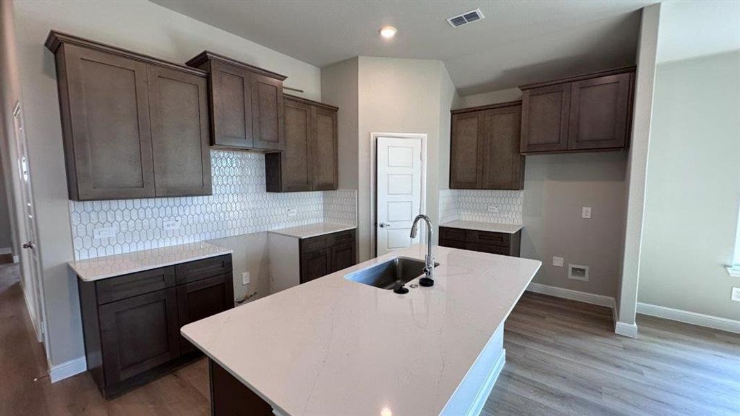 Kitchen - All Home and community information, including pricing, included features, terms, availability and amenities, are subject to change at any time without notice or obligation. All Drawings, pictures, photographs, video, square footages, floor plans, elevations, features, colors and sizes are approximate for illustration purposes only and will vary from the homes as built. Kitchen - All Home and community information, including pricing, included features, terms, availability and amenities, are subject to change at any time without notice or obligation. All Drawings, pictures, photographs, video, square footages, floor plans, elevations, features, colors and sizes are approximate for illustration purposes only and will vary from the homes as built.