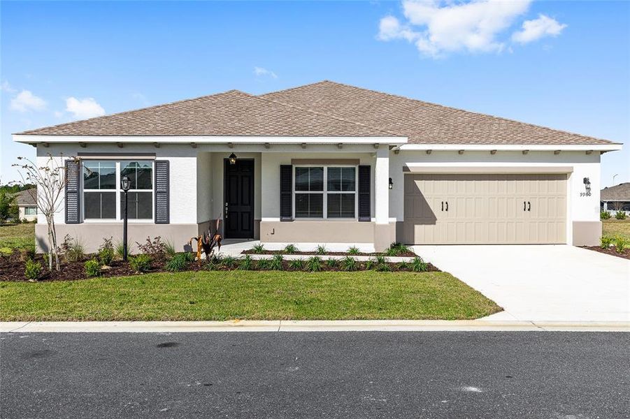 Front exterior of a new home in , Ocala, FL, highlighting curb appeal (Image 18).