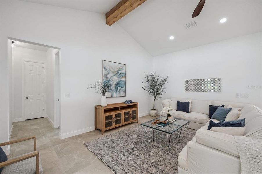 Living Room with cedar plank adorned vaulted ceiling