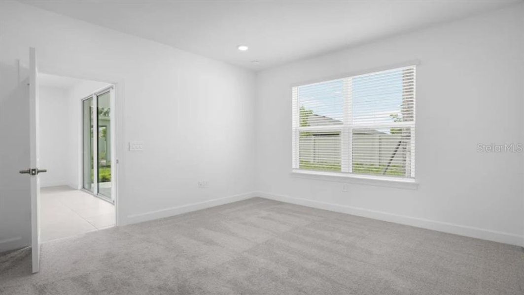 Spacious, unfurnished interior of a new home in The Cove at West Port, Port Charlotte (Image 17).