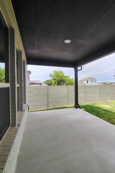 Exterior details and patio area of a home in Wolf Ranch, Georgetown (Image 22).