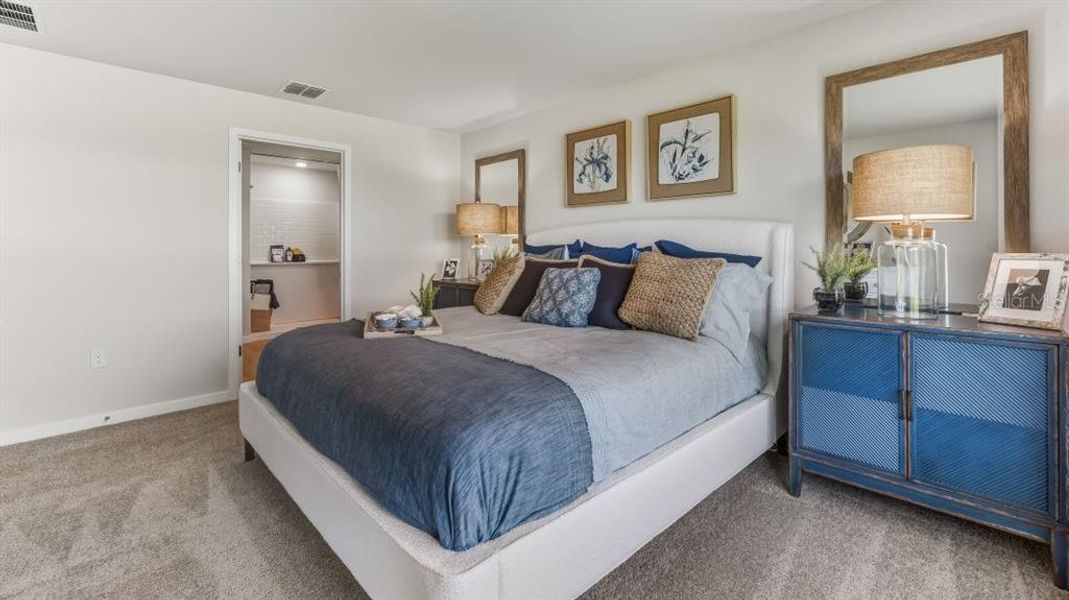 Furnished interior view inside a new home in Seagrass - Express & Tradition, Punta Gorda (Image 15). Furnished interior view inside a new home in Seagrass - Express & Tradition, Punta Gorda (Image 15).